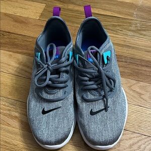 Nike Women's Gray Sneakers with Purple and Teal Accents